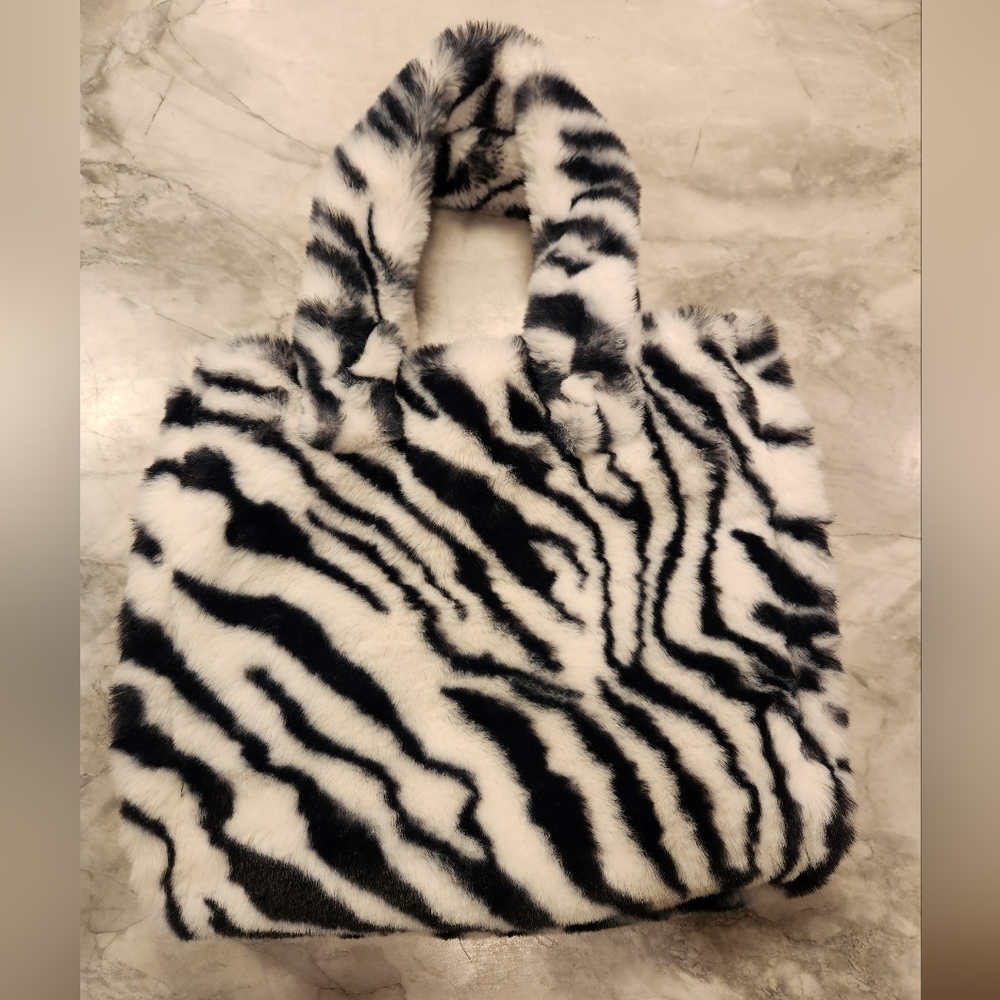 Really cute fleece zebra print tote bag from Urban Outfitters
